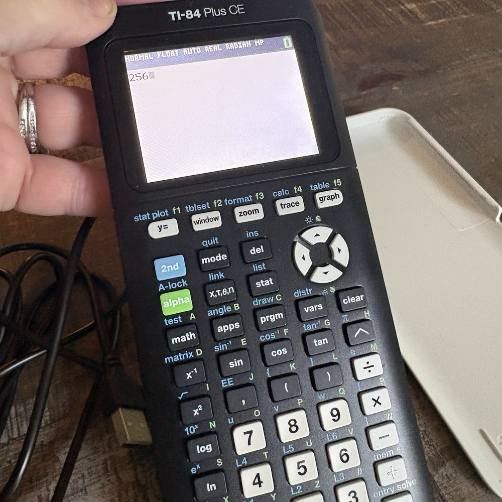 Texas Instruments TI-84 Plus CE Graphing Calculator with USB Cable - Picture 3 of 14